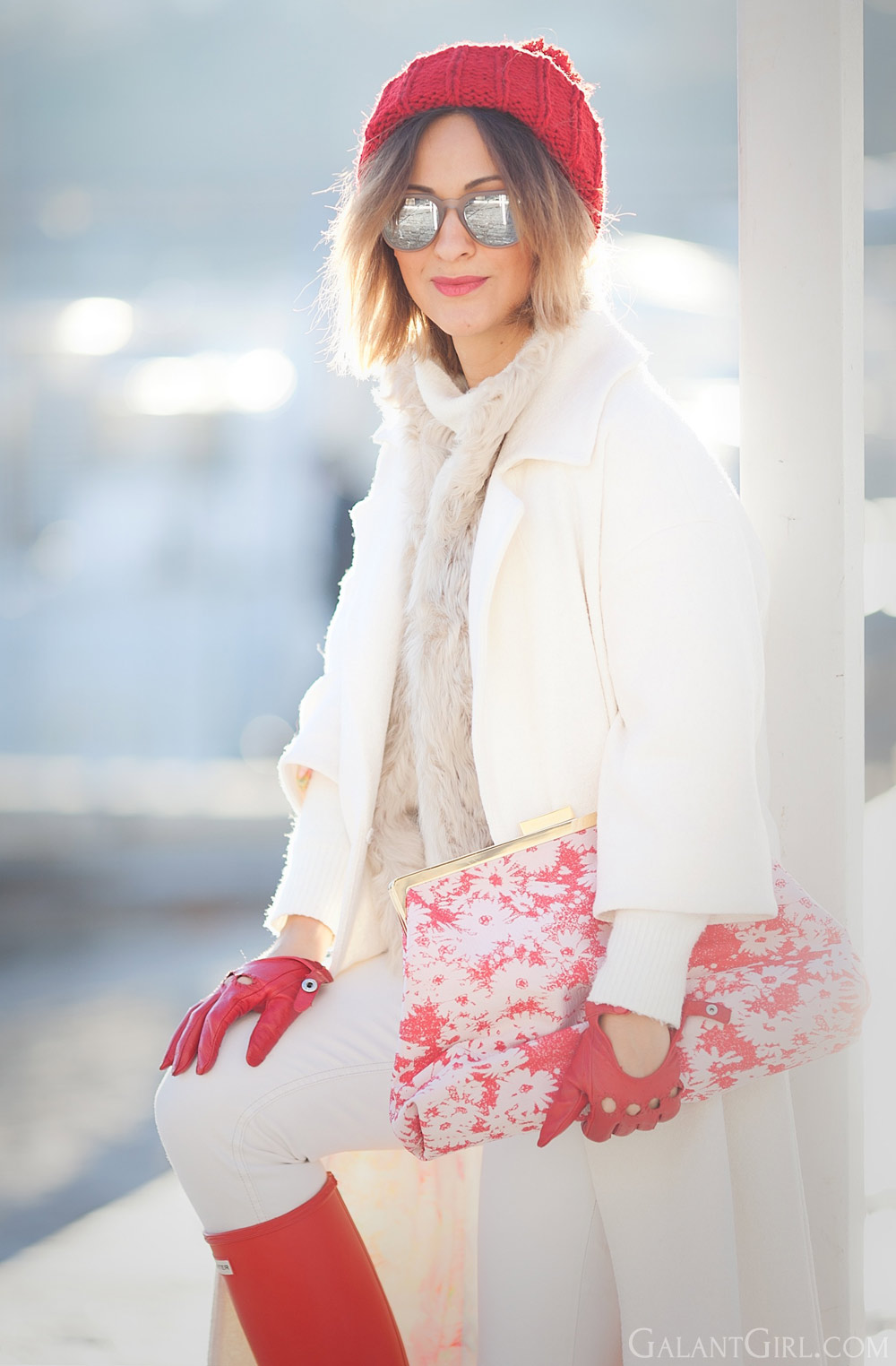 stella mccartney clutch and red hunter boots and white coat outfit for winter by fashion blogger Ellena Galant