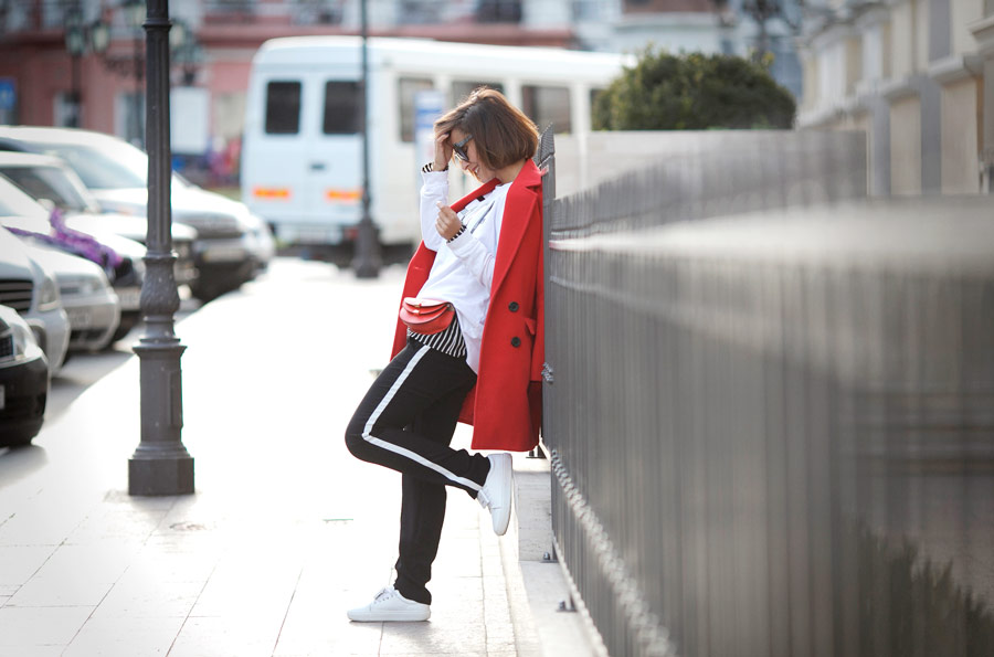 red coat outfit, red chloe bag, track pants outfit,
